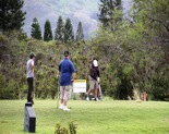 Teeing off at Par 3 11th hole at Mid Pacific Country Club