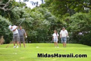 On the green of the Midas Hawaii A.P. III Memorial Golf Tournament