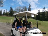 Golfers off to their next hole at the Mid Pacific Country Club