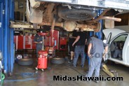 Midas Team Waipahu working on an Oil Change & tire rotation