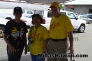Happy to donate canned goods for a good cause at Midas Waipahu