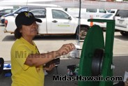Spin to Win at the Drive Out Hunger Kickoff Event Midas Hawaii Oil Change Auto Repair 022