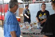 Get the ping pong ball is the Drive Out Hunger bowl and win a prize at the Kickoff Event Midas Hawaii Oil Change Auto Repair 033
