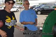 Spin to Win at the Drive Out Hunger Kickoff Event Midas Hawaii Oil Change Auto Repair 051