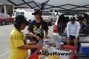 Hot dogs and lemon-aide on a warm day at the Drive Out Hunger Kickoff Event Midas Hawaii Oil Change Auto Repair 060