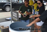 Canned goods collected at the Drive Out Hunger Kickoff Event Midas Hawaii Oil Change Auto Repair 077