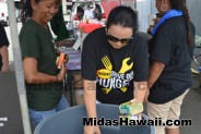 Canned good collected at the Drive Out Hunger Kickoff Event Midas Hawaii Oil Change Auto Repair 081