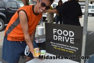 Happy to donate to a good cause at the Drive Out Hunger Kickoff Event Midas Hawaii Oil Change Auto Repair 089