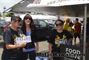 Staff thanking Kelly who actually went shopping to give at the Drive Out Hunger Kickoff Event Midas Hawaii Oil Change Auto Repair 129