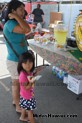 Hot dogs for even the littlest one at the Drive Out Hunger Kickoff Event Midas Hawaii Oil Change Auto Repair 132